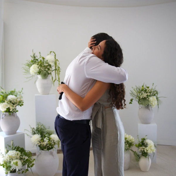 Happy couple show off their intimate engagement moment with the help of Somnis Proposals