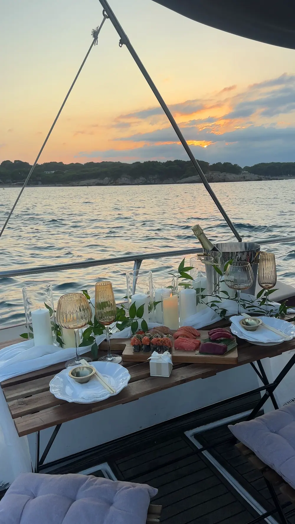 A seaside setup on a boat as a proposal service by Somnis Proposals
