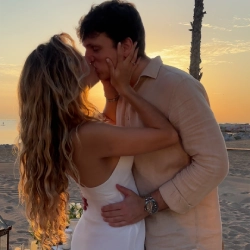 Happy couple show off their intimate engagement moment with the help of Somnis Proposals