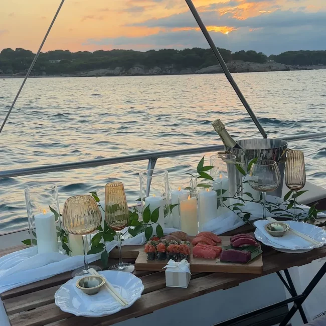 A seaside setup on a boat as a proposal service by Somnis Proposals