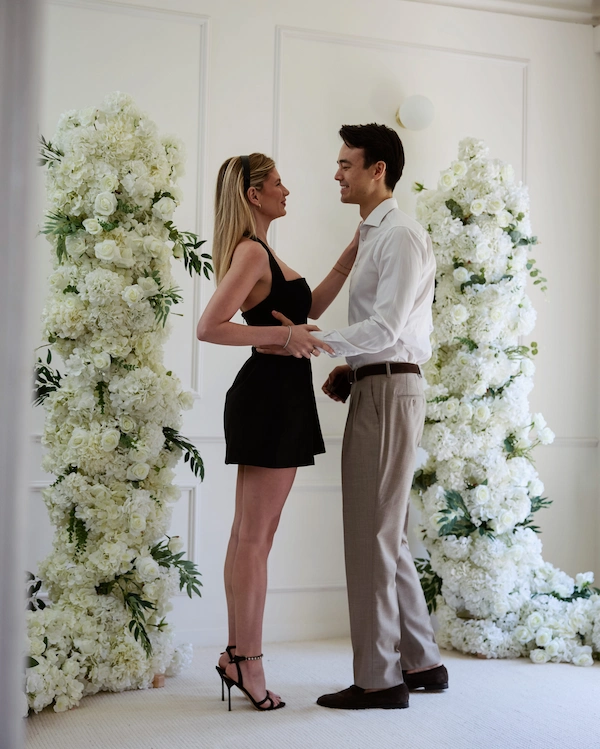 Happy couple show off their intimate engagement moment with the help of Somnis Proposals